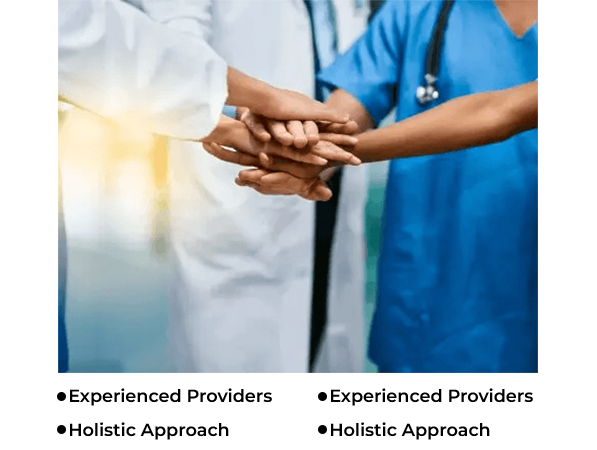 Healthcare professionals join hands, symbolizing unity and teamwork.